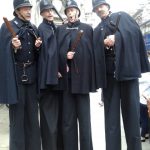 stilt walking policemen