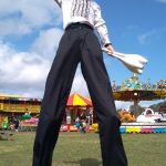 disco themed stilt walker