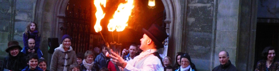 fire juggler performing a show