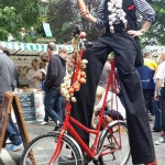 french themed stilt walker