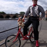 french themed entertainer on a bike