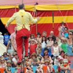 knive juggler on a unicycle