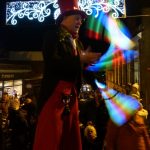 glow juggler on stilts