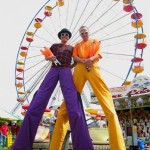 stilt walkers at fair