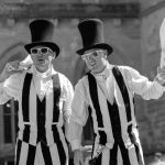 stripes, stilts, jugglers