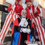 christmas stilt walkers