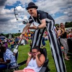 juggling stilt walker entertainer