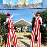 music festival stilt walkers