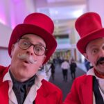 comedy entertainers, stilt walkers, greatest showman